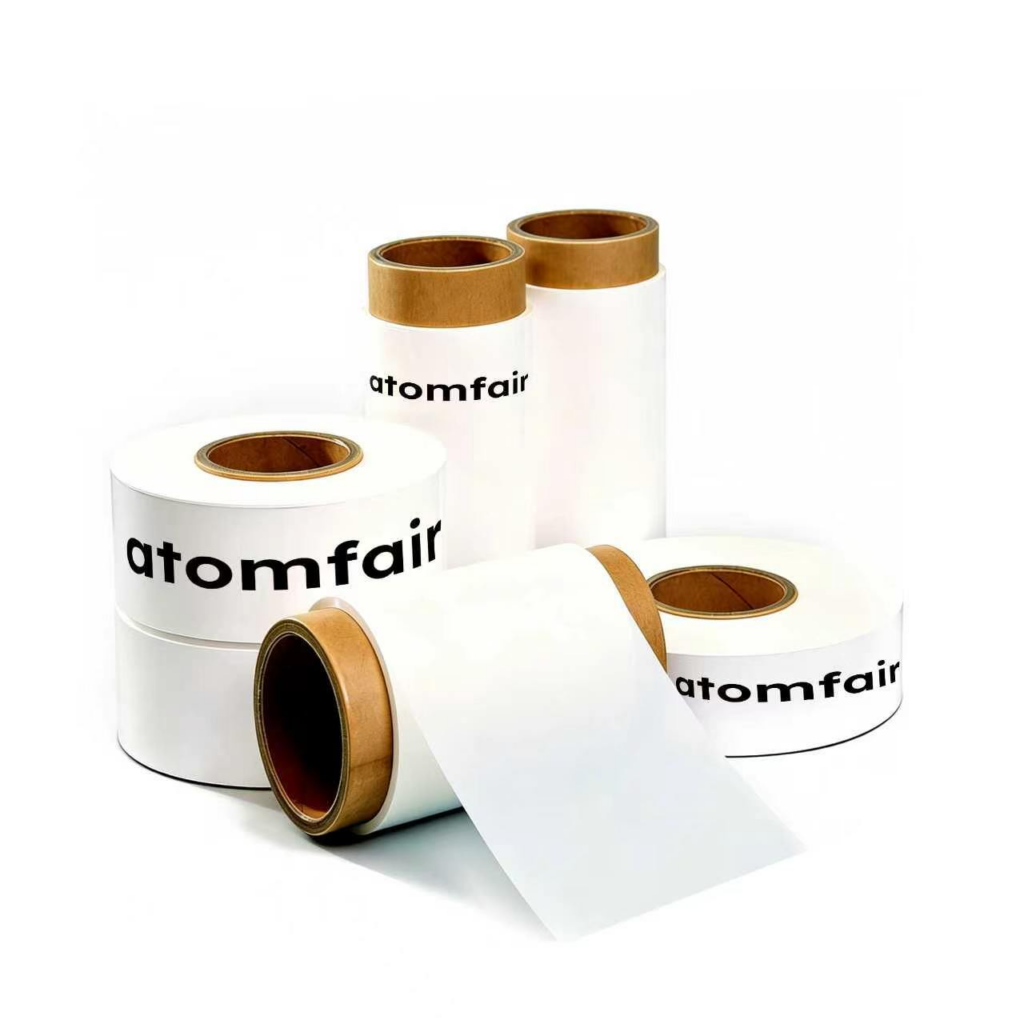 ATOMFAIR® a roll of white PVDF coated separator membrane showing a matte textured sheet extending flat onto a plain background.