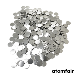 ATOMFAIR® a large pile of circular metallic 304 and 316L stainless steel conductive spacers on a white background.