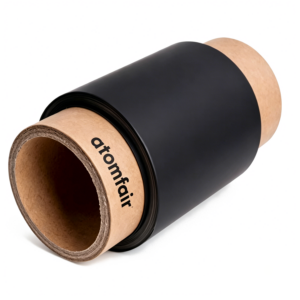 ATOMFAIR® roll of matte black 91um DNP aluminum-laminated film with a brown cardboard core on a white background.