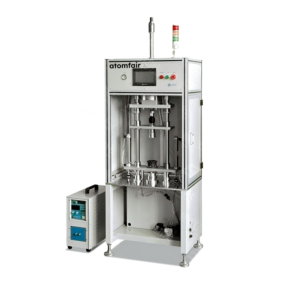 ATOMFAIR® automatic cell shelling machine featuring a white frame processing station with a top stack light next to a small side control tower.