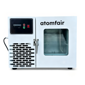 ATOMFAIR® white lab freezer with a digital control panel, metal door latch, and square glass window on a bright background.