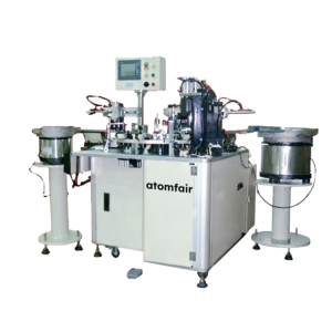ATOMFAIR® automatic riveting machine system featuring a cream central station with a raised control screen, flanked by two stainless steel vibratory bowl feeders.