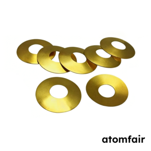 ATOMFAIR® small cluster of gold au-coated conical disc springs arranged on a white background.
