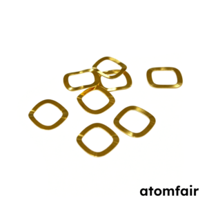 ATOMFAIR® small group of gold au-coated wave spring washers clustered on a white background.