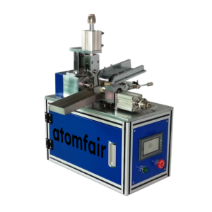 ATOMFAIR® cylindrical battery grooving machine with a blue control cabinet, digital screen, and top metal mechanical tooling.