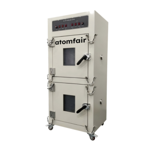 ATOMFAIR® battery explosion-proof chamber showing a dual-tier cream cabinet with square glass windows, thick metal chains, and a top digital controller.