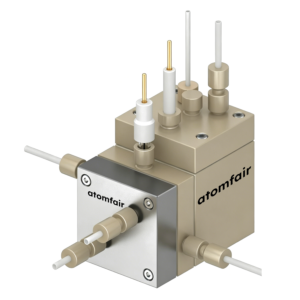 ATOMFAIR® dual-chamber flow cell with double beige block body, steel front plate, and multiple top electrodes.