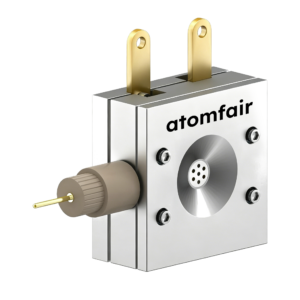 ATOMFAIR® three-electrode battery cell with metallic body, two top gold tabs, and a protruding side reference pin.