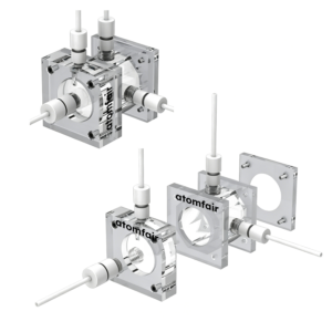 ATOMFAIR® battery cell 3D model with clear blocks, circular viewing windows, white gas tubes, and assembled blocks.