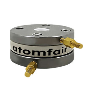 ATOMFAIR® cylindrical steel microscopy battery testing fixture with a central glass window and two brass connectors on a white background.