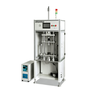 ATOMFAIR® SCL-637 semi-automatic cell case loading machine with a vertical press frame and an external control unit.