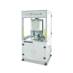 ATOMFAIR® SSM-673 precision spinning sealing machine enclosed in a clear safety cabinet with a top dial control panel.