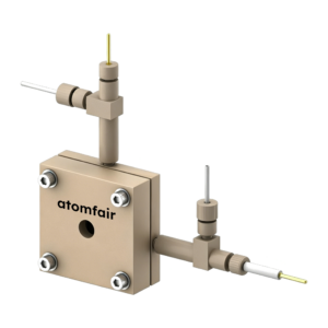 ATOMFAIR® transmission FTIR cell with beige block block housing, corner bolts, and vertical needle ports.