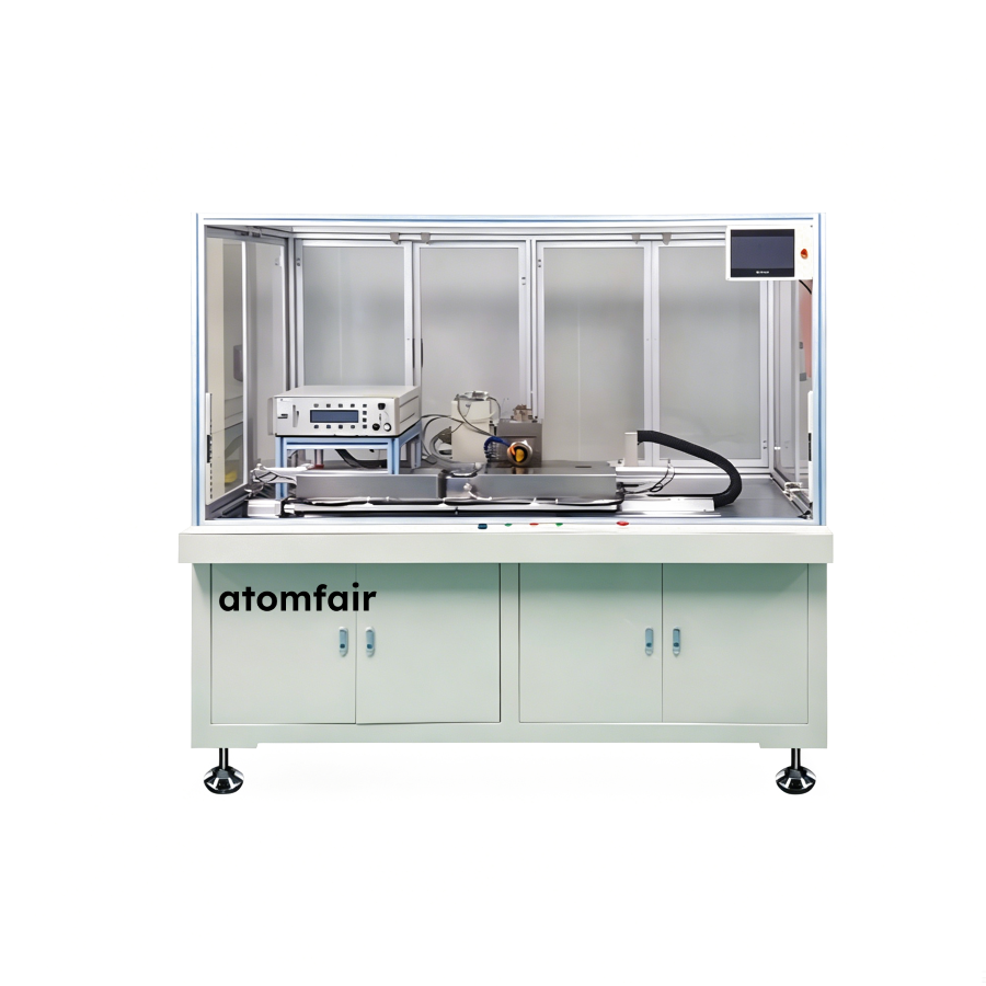 USW-724 Ultrasonic Welder Cylindrical Batteries ATOMFAIR® 1 ATOMFAIR® USW-724 automatic ultrasonic welding machine station enclosed in a white glass safety frame with an inner control device.