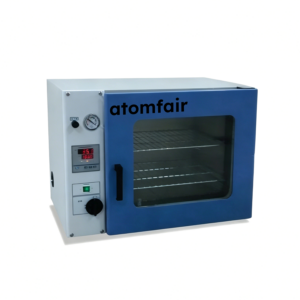 ATOMFAIR® VacDry729 benchtop vacuum drying oven featuring a blue square door with a viewing window and a side pressure gauge.