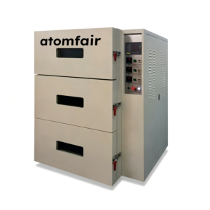 ATOMFAIR® VO386 industrial 3-chamber vacuum oven featuring independent vertical compartments and warning safety labels.